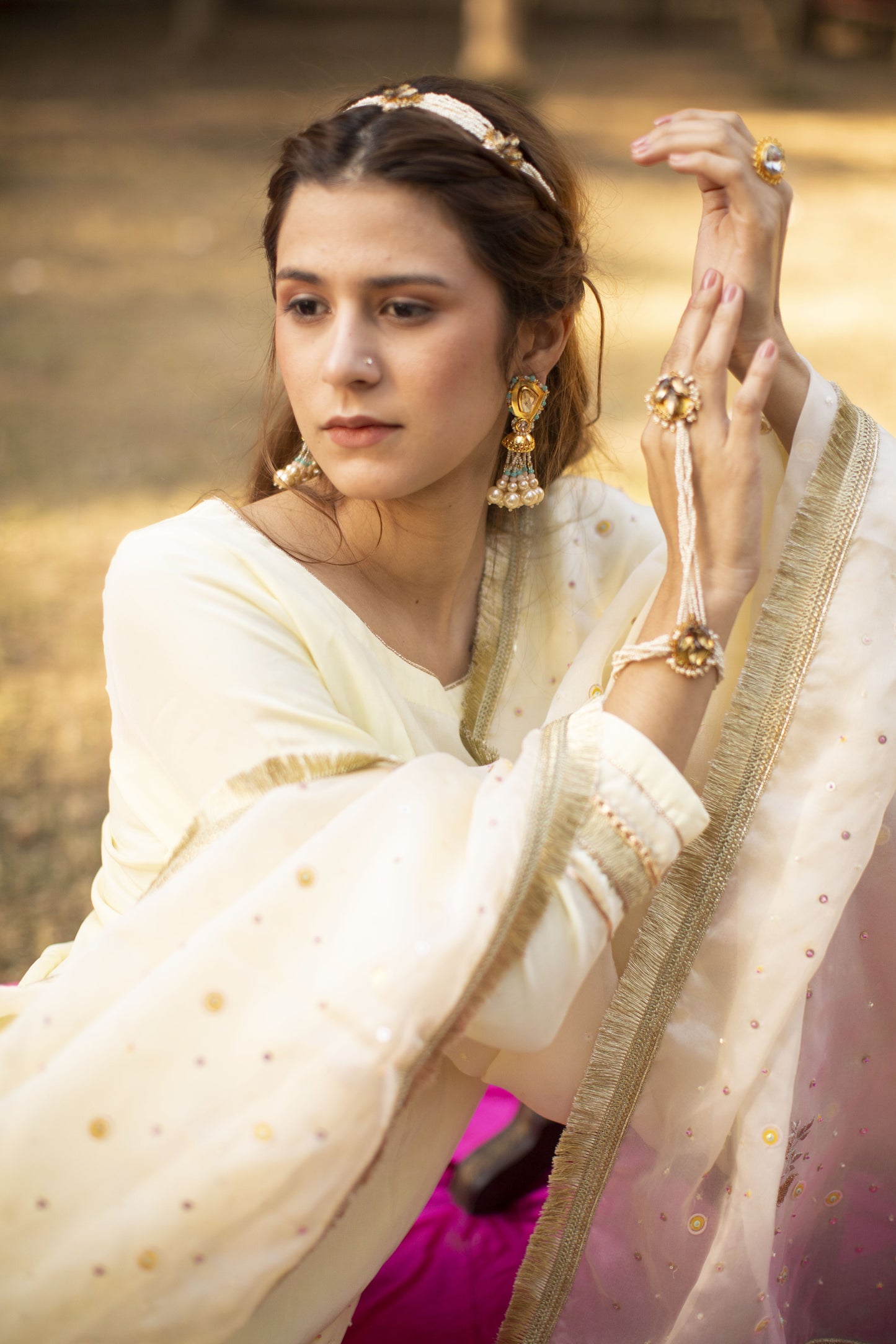 Powder yellow multicolored sequines suit with garara and kiran organza dupatta