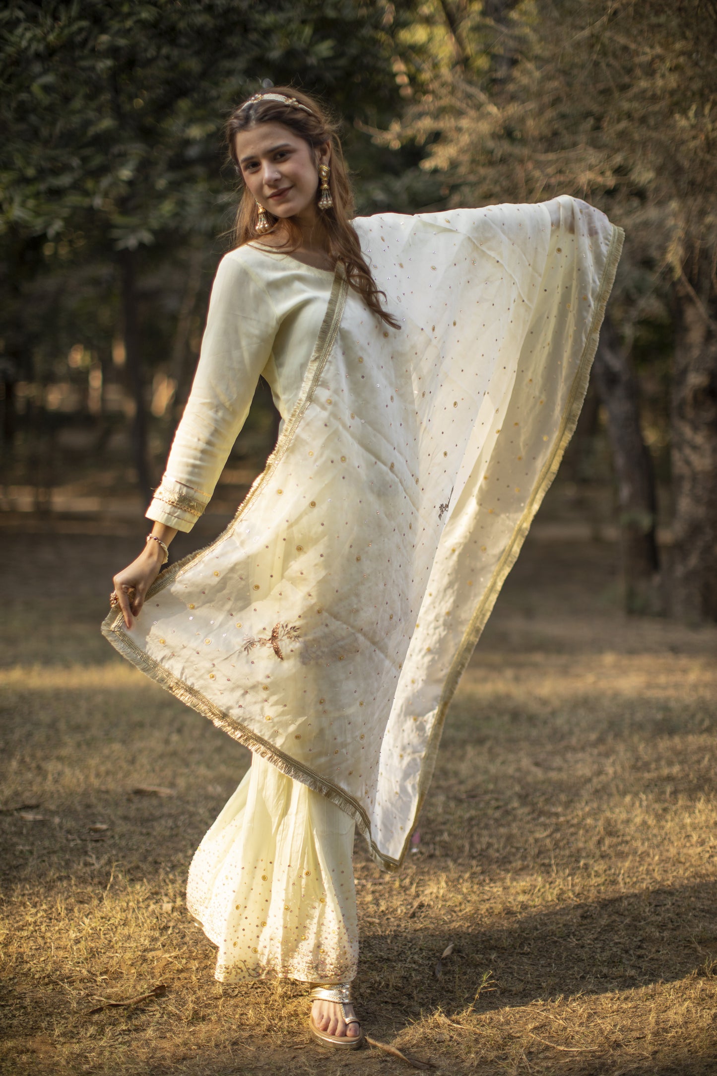 Powder yellow multicolored sequines suit with garara and kiran organza dupatta