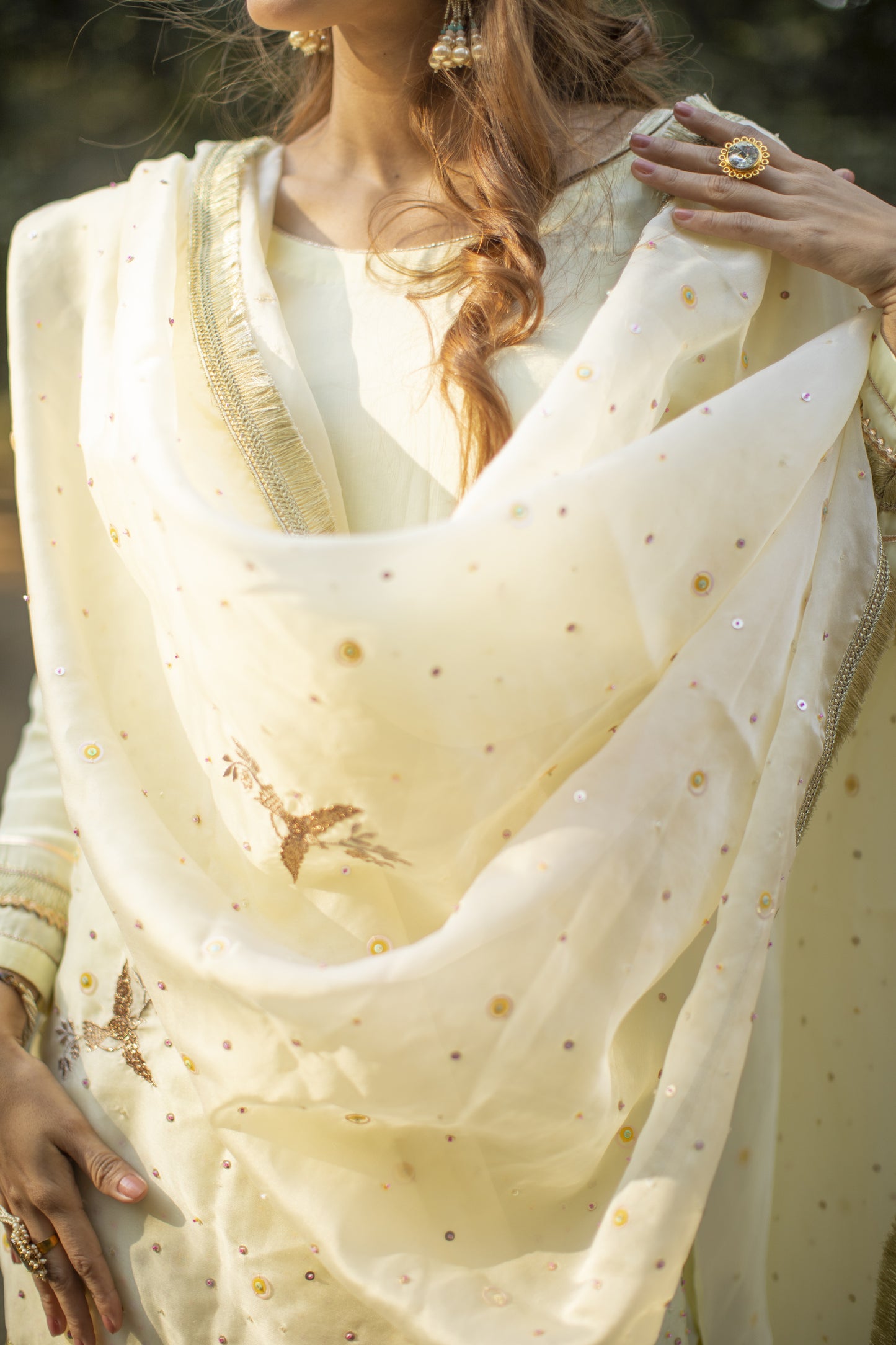 Powder yellow multicolored sequines suit with garara and kiran organza dupatta