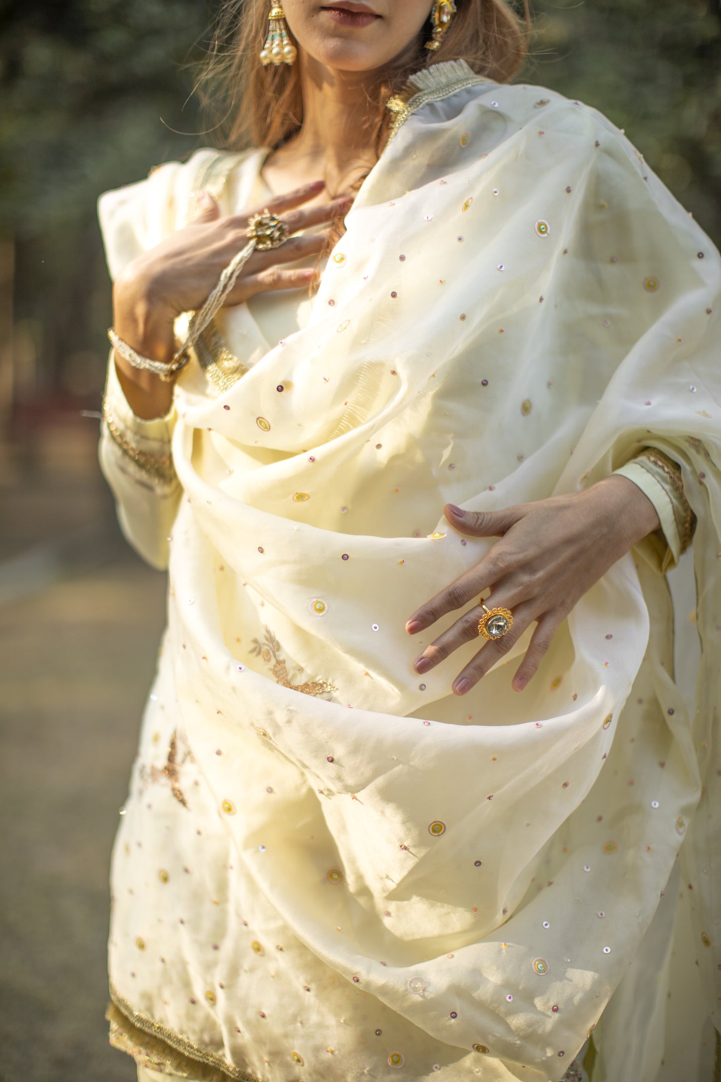 Powder yellow multicolored sequines suit with garara and kiran organza dupatta