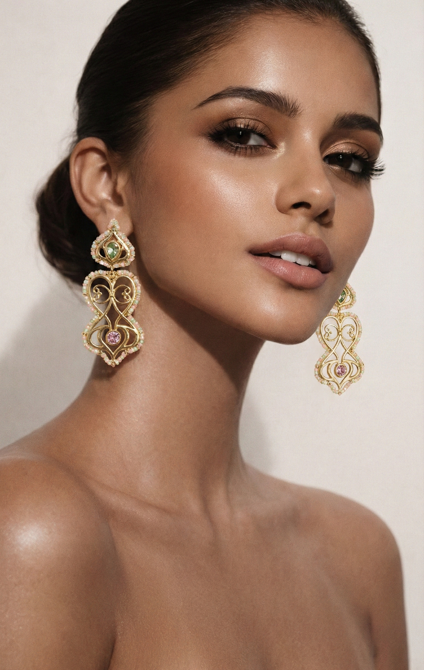 Woman wearing gold earrings with a 'Luxury' label at the bottom.