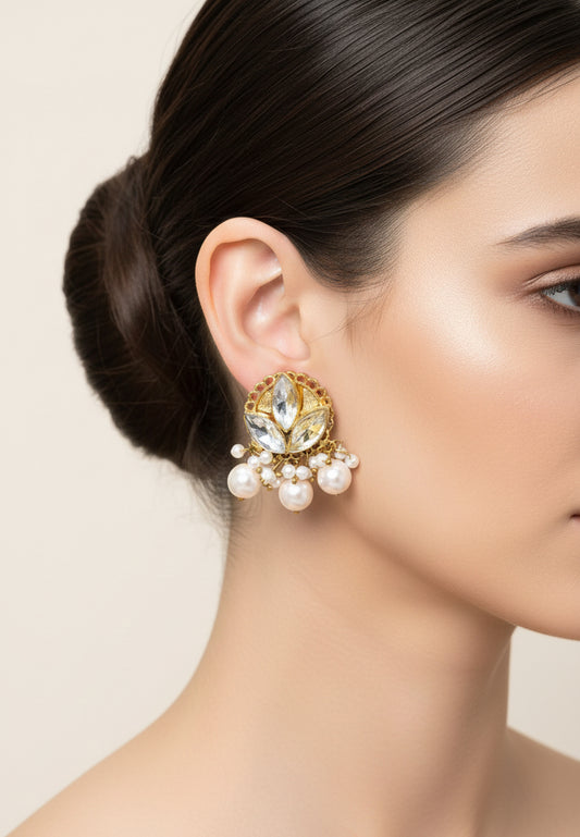 golden shadow with pearl earrings