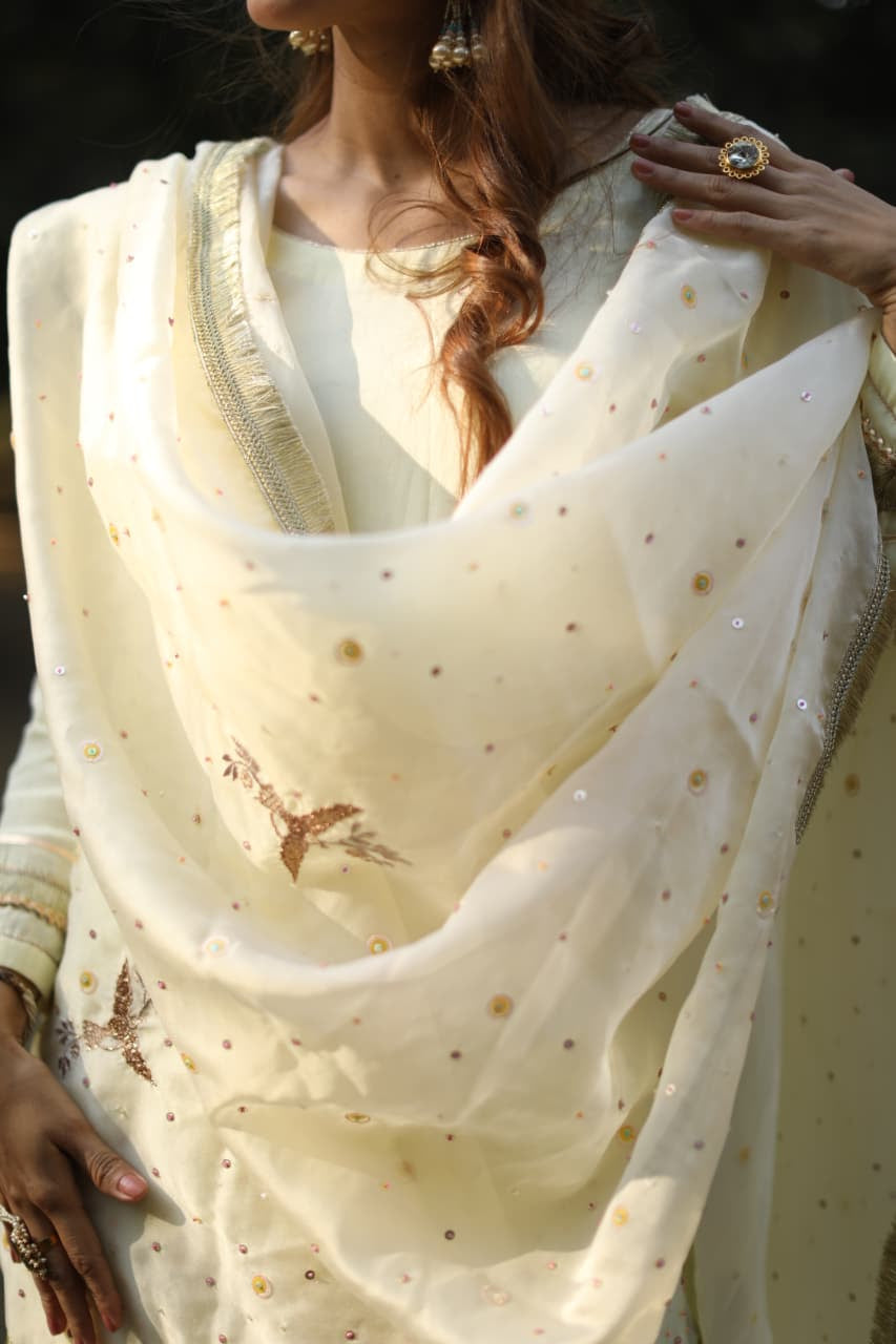 Powder yellow multicolored sequines suit with garara and kiran organza dupatta